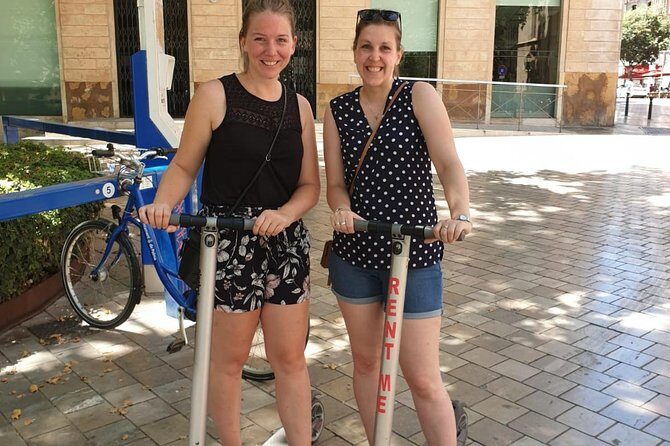 1 Hour Electric Scooter Tour in Palma - Catedral de Mallorca and Palau de l’Almudaina: the architecture story stop