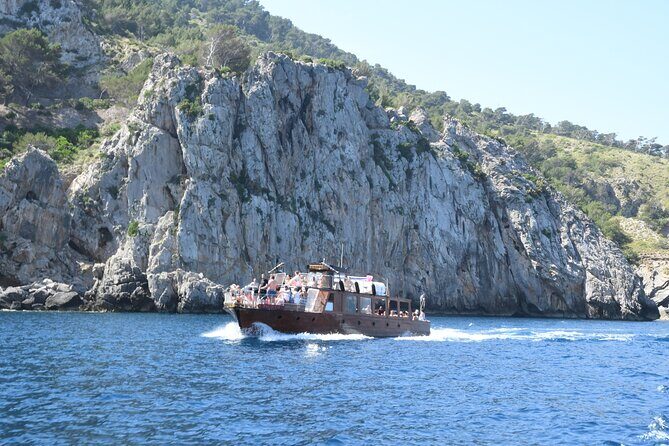 5-Hour Guided Robinson Boat Day Tour in Northern Mallorca - Pollensa Bay First Stop: Swimming, Snorkeling, and Paddle Board Time