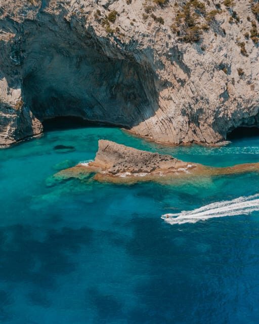 Alcudia: JetSki Tour Coll Baix beach & Caves (free Photos) - Coll Baix caves: when waves decide the script