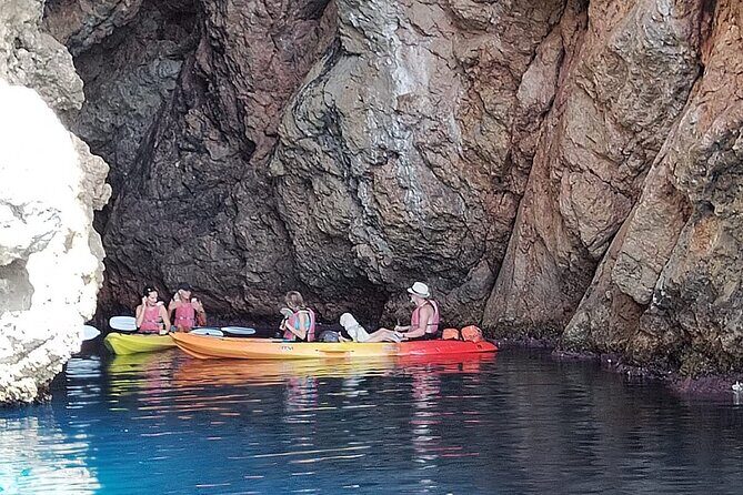 Breathtaking guided Kayak tour from Sant Elm the bay of Cala en Tió - Cala en Tió: caves, cliffs, and your swim or snorkel break