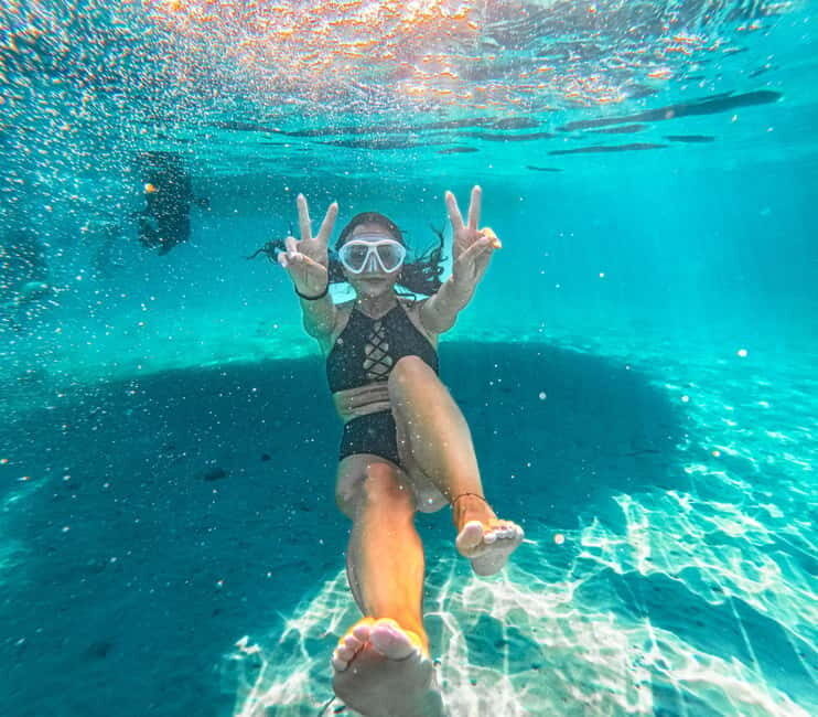 Can Picafort:Private Trip - Beach+Caves + Seabob -6 Person - Coll Baix beach by boat: why this stop feels different