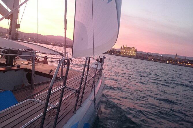 Catamaran sailing at sunset with tapas Palma de Mallorca - Cala Vella nature reserve: swimming time and paddle surf included