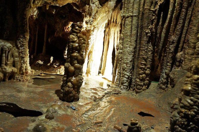 Caves of Genova Admission in Palma de Mallorca - Stepping inside: steep stairs, slippery spots, and better photos