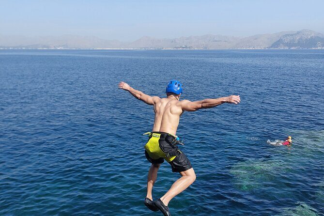 Coasteering Cliff jumping - Port d’Alcudia: cliff-jump energy, snorkeling breaks, and the best cave moments