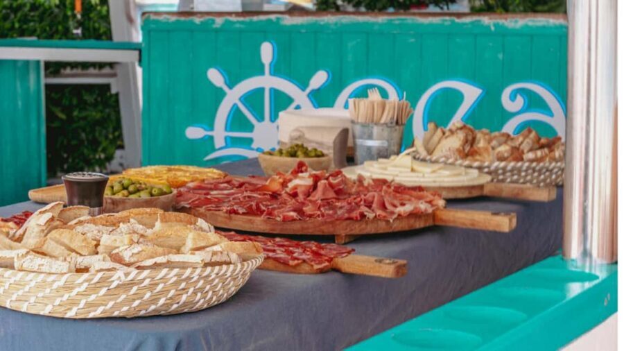 From Magaluf: Palma Bay Sightseeing Cruise with Live Music - Lunch Buffet on Board: Spanish Omelette, Serrano Ham, and Fruit