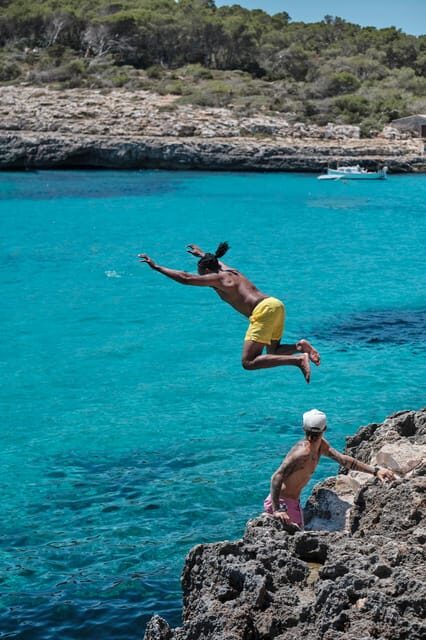 From Palma: Portal Vells Beach and Cave SUP & Snorkel Tour - What the guides do well: organization, adjustments, and photo help