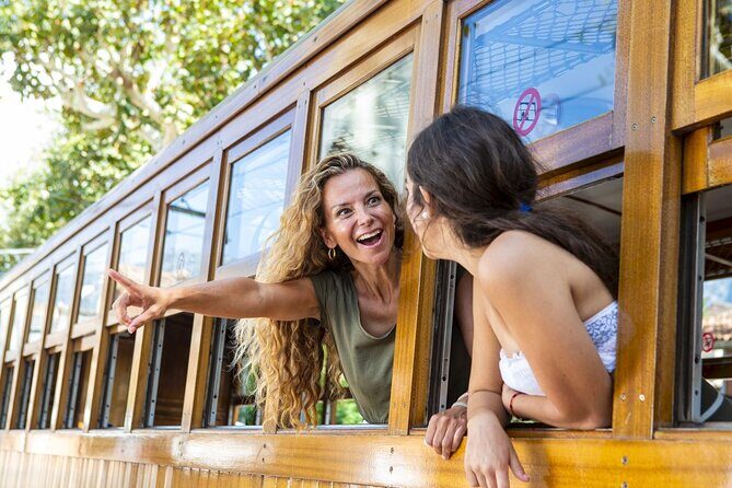 Island Tour with Train Tram Boat and Bus from Cala Millor - Sa Calobra village time: beach air, port cafés, and a little breathing space