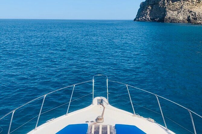 Mallorca Beach & Caves 4hr Boat Trip Drinks, Tapas, SUP & Snorkel - Coll Baix swimming stop: crystal water and real activity time
