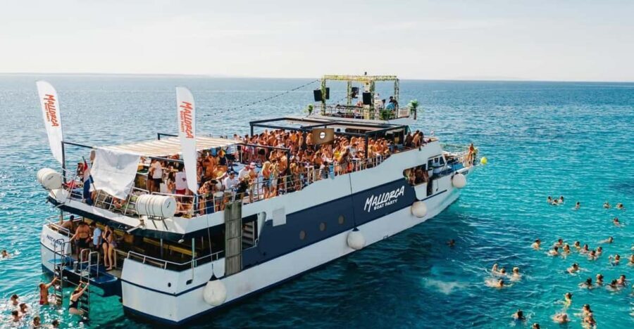 Mallorca: Boat Party with Live DJs, Lunch, & Nightclub Entry - Lunch onboard: paella + pasta salad + fruit (and why it’s the smartest part)