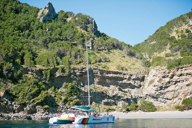 Mallorca Catamaran Cruise with Scenic Views and BBQ Lunch - First swim stop at Platja des Coll Baix: short, secluded, and easy