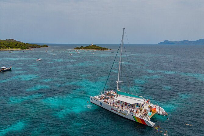 Mallorca Catamaran Cruise with Scenic Views and BBQ Lunch - Food, drinks, and the onboard bar: simple meal, easy add-ons