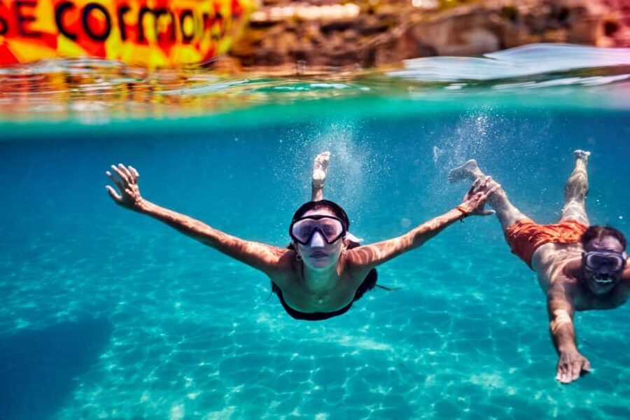 Mallorca: Caves, Cliffs, and Coves Boat Trip - What the crew adds: friendliness, singing, and the small moments