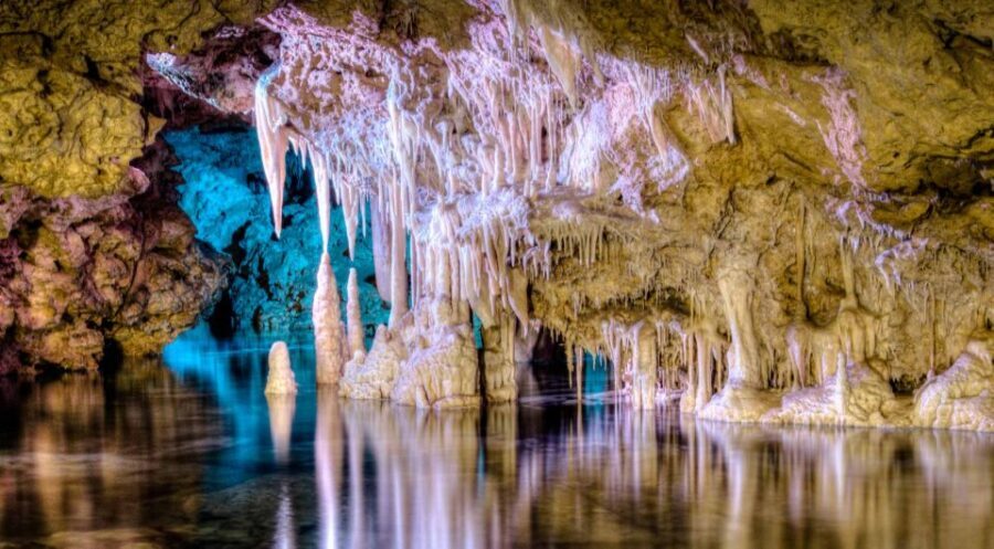 Mallorca: Caves of Hams Entry Ticket with Transportation - Entering the illuminated halls of the Caves of Hams