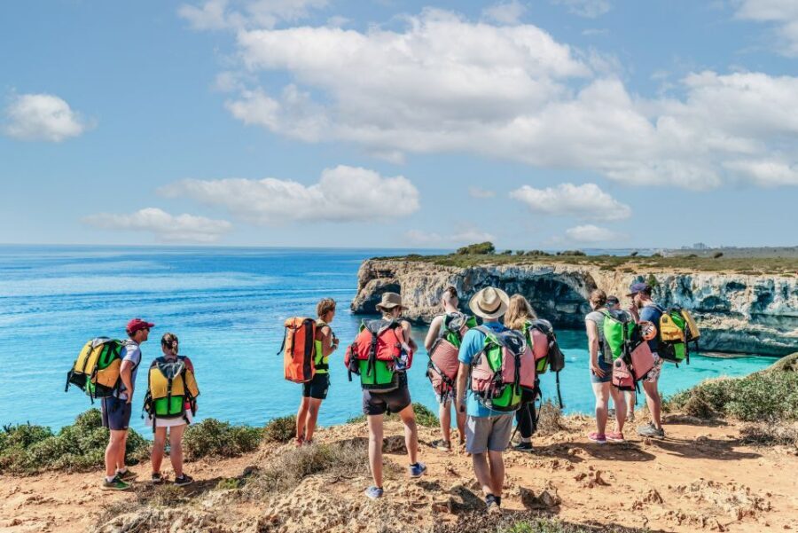 Mallorca: Cova des Coloms Caving Trip with Hotel Transfer - The swim-and-cave moment: limestone views and the cliff jump option