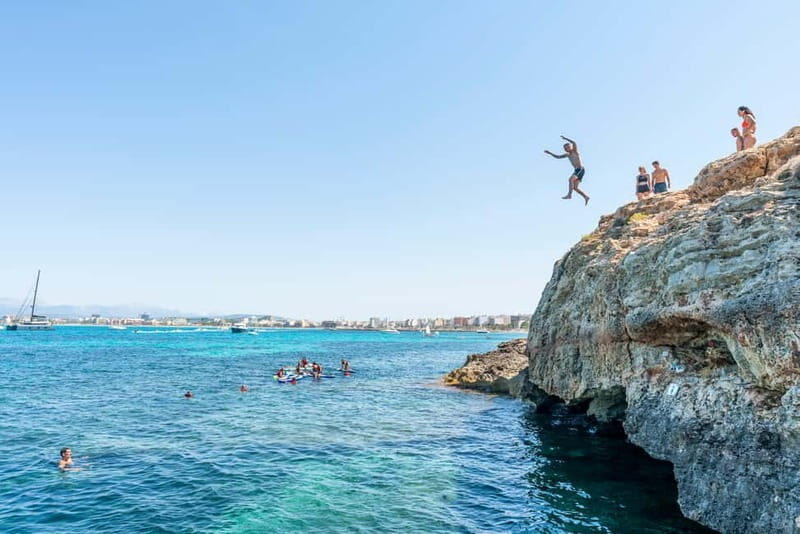 Mallorca: Quad Bike Tour, Snorkeling, and Cliff Jumping - Snorkeling in a Warm Mediterranean Bay