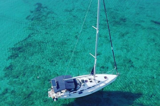 Mallorca sailing, snorkelling, as a Local with drinks and food - Food and Drinks on Board: Pizza, Beer or Wine, and the Water Math