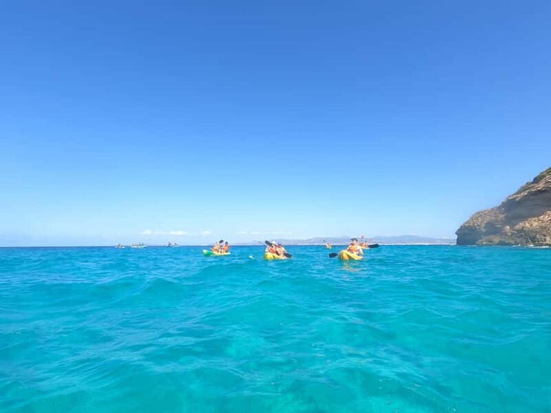 Mallorca: Sea Cave Kayaking Tour with Snorkeling and a Snack - Sea Caves and Cliff Views: Where the Scenery Takes the Lead