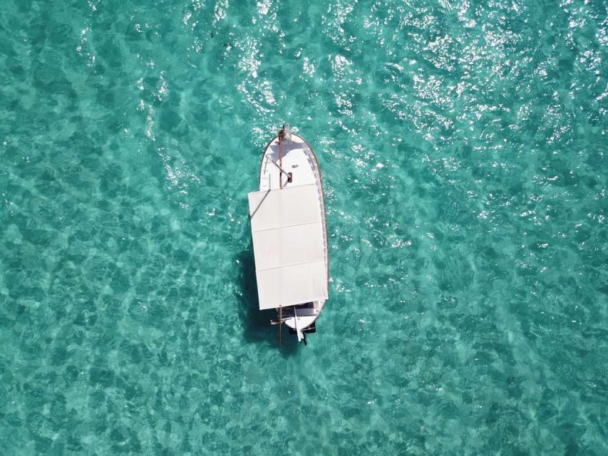 Mallorca: Southern Beaches Private Llaut Boat Tour - Es Trenc swim and snorkel: where the water color steals the show