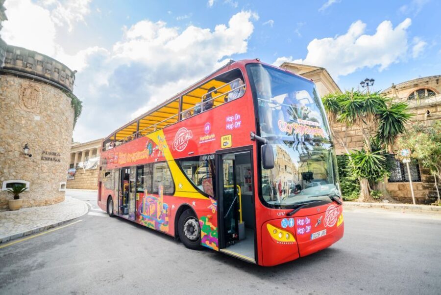 Palma de Mallorca: City Sightseeing Hop-On Hop-Off Bus Tour - Bellver Castle vs Spanish Village: which Essential stop should you pick