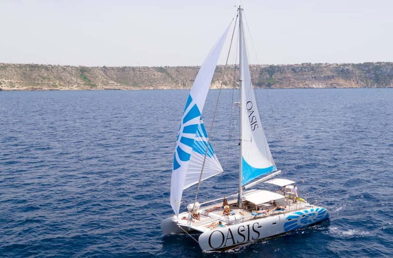 Palma de Mallorca: Deluxe Catamaran Sailing Tour with Meal - Cala Vella: the swim-and-photo stop that anchors the day