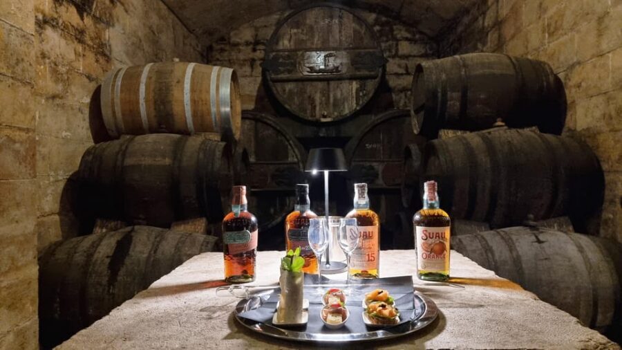 Palma: Distillery Tour with 3 Spirits and Tapas Tasting - Taste brandy directly from the barrel: 15, 25, and 50 years