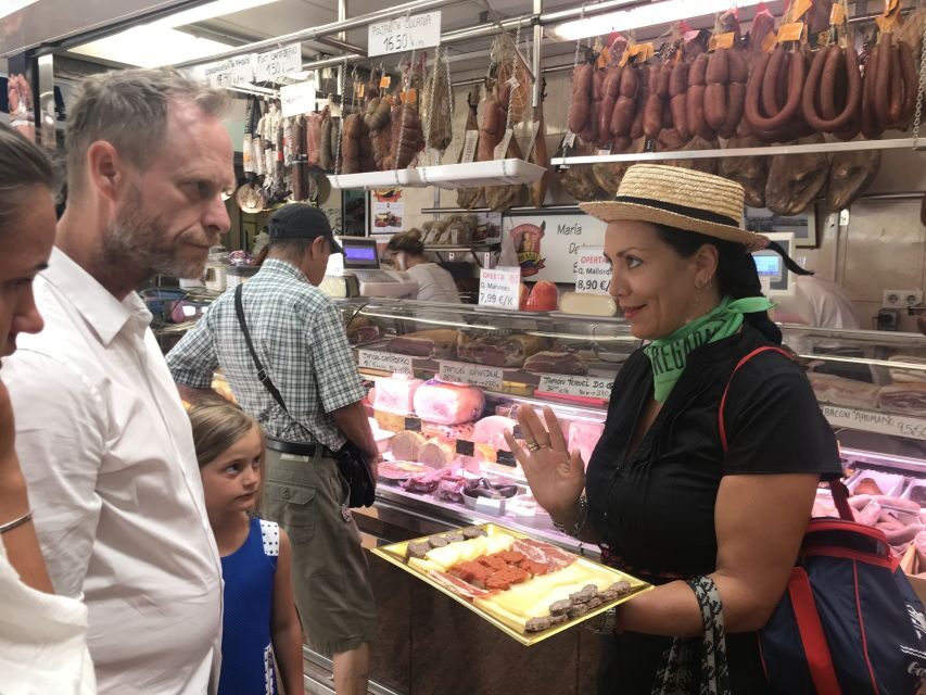 Palma: Walking Tour with Mediterranean Delicacies - Consulado del Mar and the fishing harbor: where trade turned into power