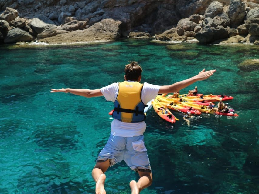 Pollença: Kayak and Coasteering Cliff Jumping - The paddle out: a circular kayak route with real open-water time