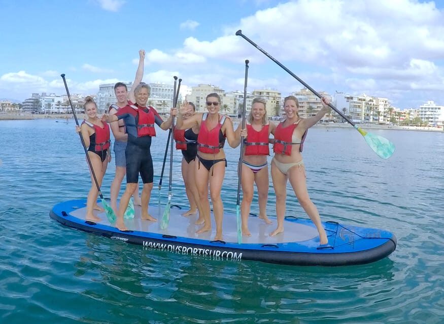 Rent a Giant Stand Up Paddle XXL for groups - Giant XXL SUPs Over the Bay of Ca’n Pastilla