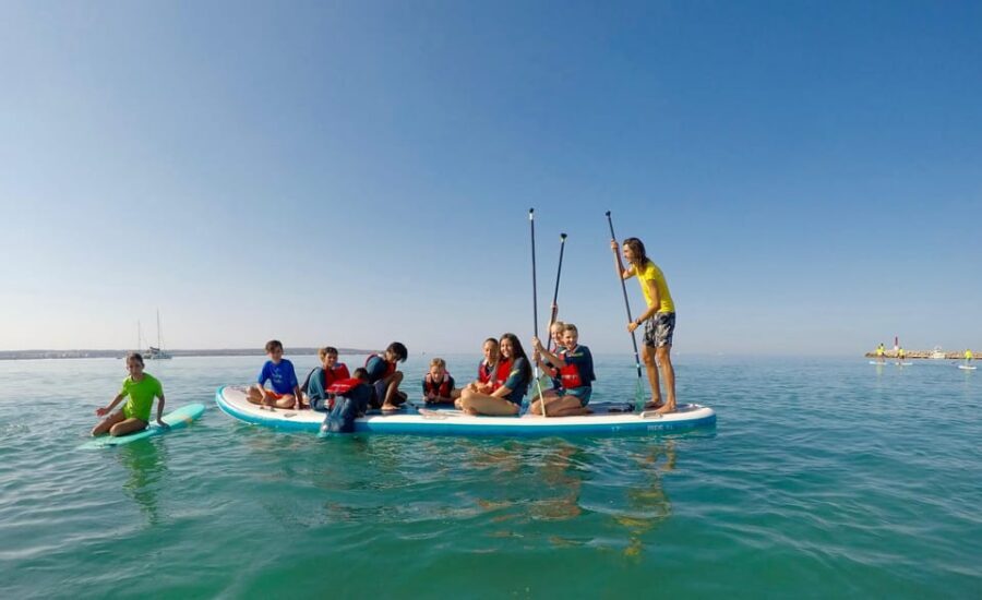 Rent a Giant Stand Up Paddle XXL for groups - Gear and Beach Comfort: Lockers, Shower, and Life Jackets