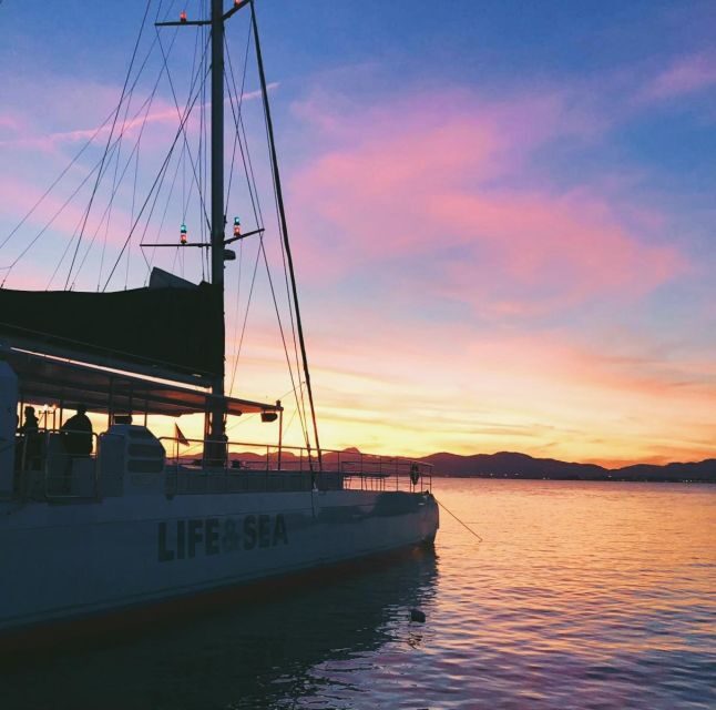 S'Arenal: Sunset Catamaran Cruise with BBQ - Sunset views at Cap Enderrocat and the return with good timing