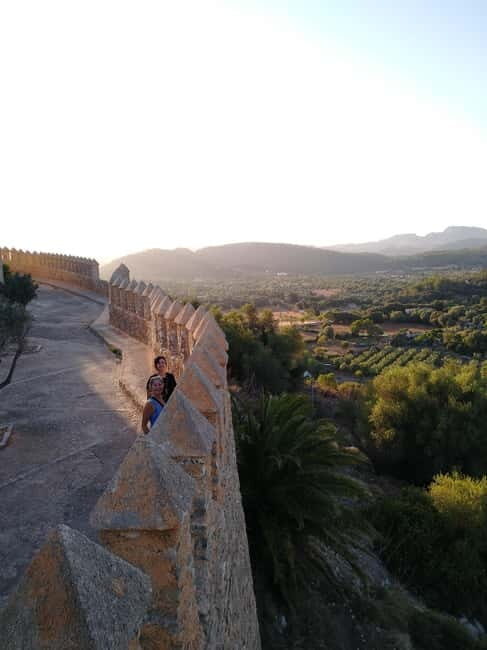 Travel and play tennis in Mallorca - A day that mixes fortress walls, caves, and clay-court tennis